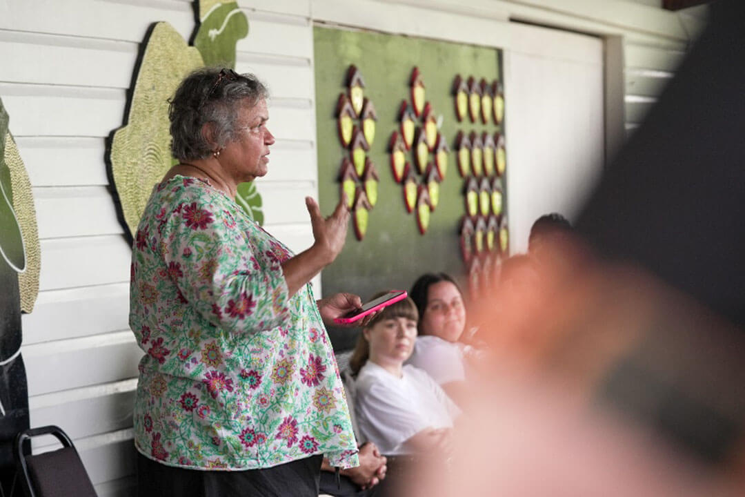 Aunty Bronwyn a proud Waka Waka woman speaking to Knowmore Legal Service staff at the Cherbourg Ration Shed Museum